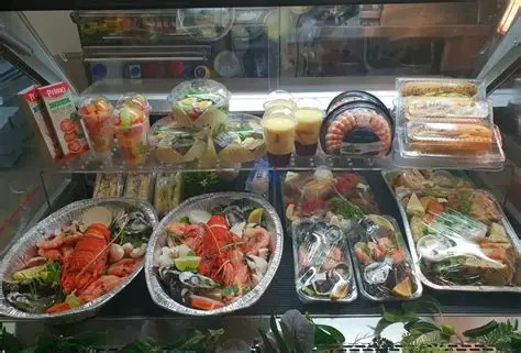 Fresh seafood, salads, juices and ready-to-eat meals display